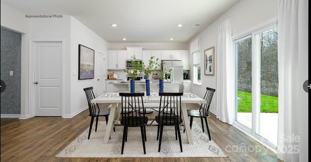 dining space featuring a wealth of natural light, baseboards, and dark wood-style flooring