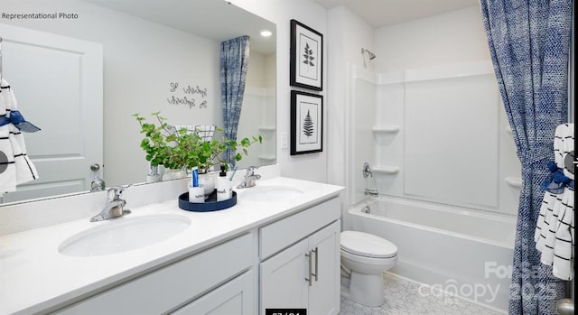 bathroom featuring a sink, toilet, shower / bath combo, and double vanity