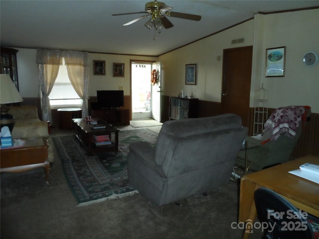 carpeted living room featuring lofted ceiling, visible vents, a wealth of natural light, and ceiling fan