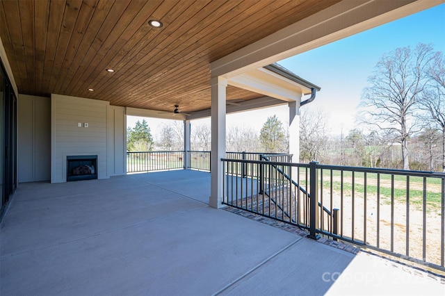 view of patio featuring a ceiling fan