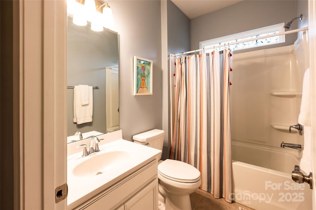 bathroom with vanity, shower / bath combination with curtain, toilet, and tile patterned flooring