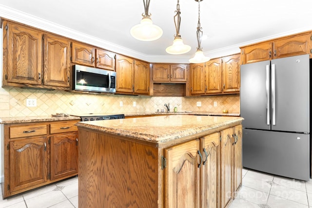1080 Rolling Green Dr, Newton, NC 28658 - kitchen featuring appliances with stainless steel finishes, light tile patterned flooring, light stone countertops, a kitchen island, and brown cabinetry