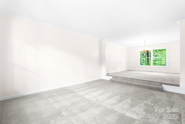 1080 Rolling Green Dr, Newton, NC 28658 - carpeted empty room with crown molding, baseboards, and a chandelier