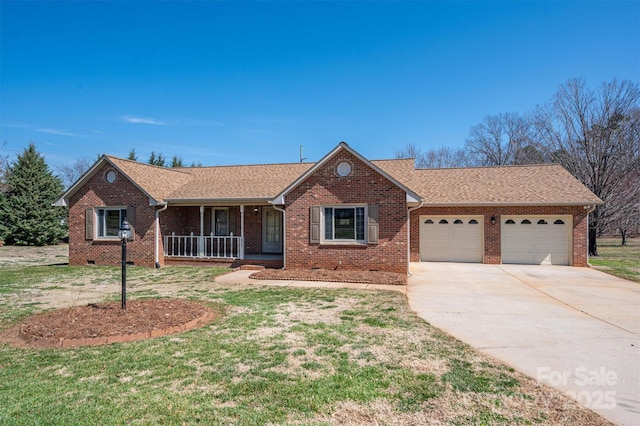 ranch-style house with brick siding, covered porch, concrete driveway, and a garage