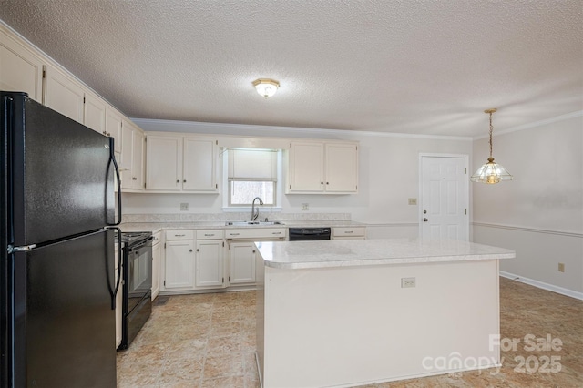 kitchen with a kitchen island, crown molding, light countertops, black appliances, and a sink