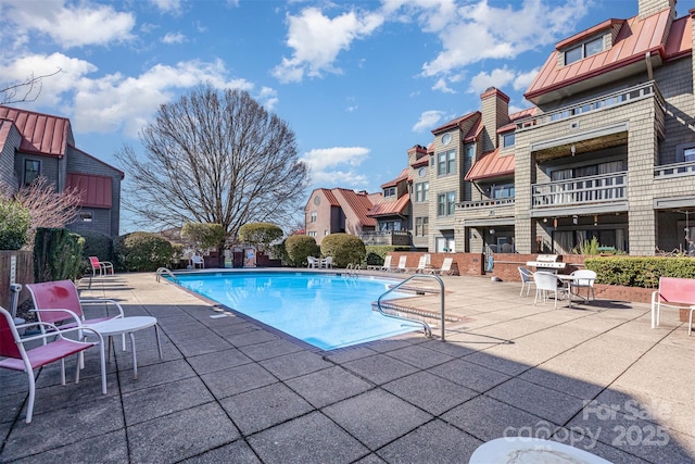 pool featuring a patio