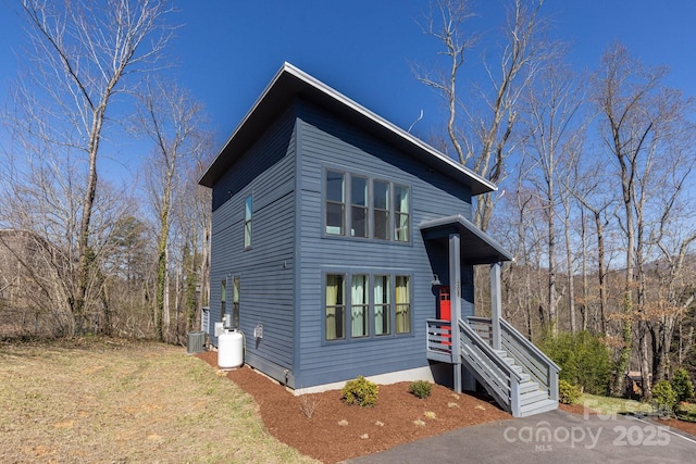 view of front of house with central AC unit