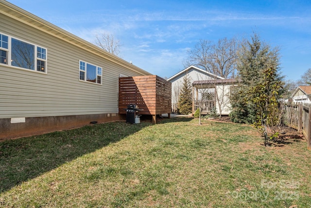 view of yard featuring fence