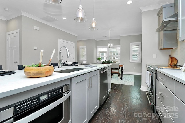 kitchen with stainless steel electric stove, gray cabinetry, wall chimney exhaust hood, and a sink