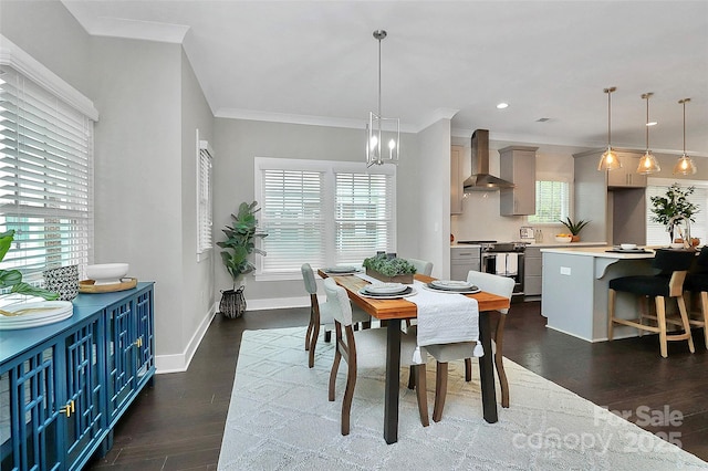 dining room featuring baseboards, ornamental molding, recessed lighting, an inviting chandelier, and dark wood-style floors