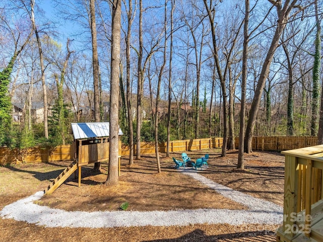 view of play area featuring a fenced backyard