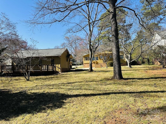 view of yard featuring a deck