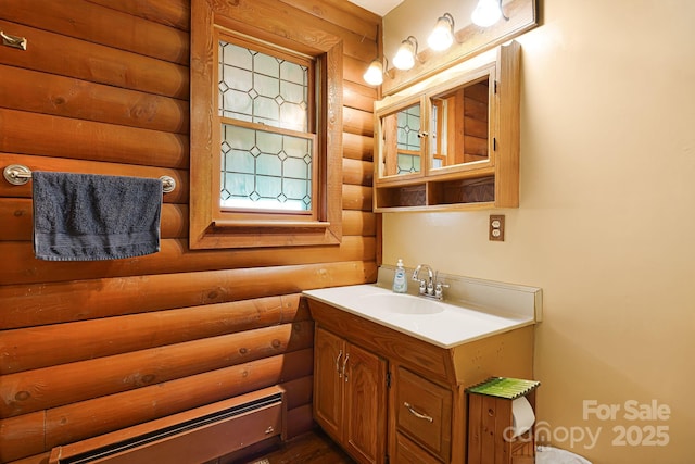 half bathroom featuring log walls and vanity