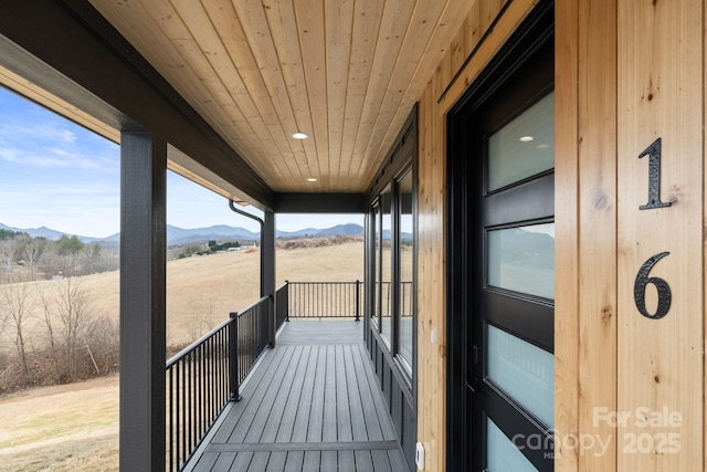 balcony featuring a mountain view