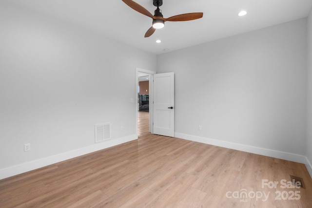 unfurnished room with visible vents, light wood-style flooring, recessed lighting, baseboards, and ceiling fan