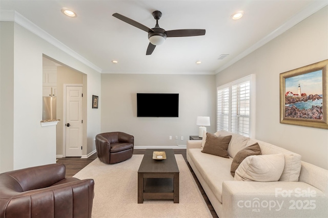 living room with ceiling fan, baseboards, ornamental molding, recessed lighting, and wood finished floors