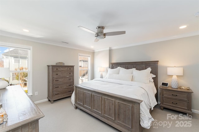 bedroom featuring a ceiling fan, visible vents, baseboards, light carpet, and crown molding