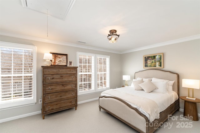 bedroom featuring attic access, crown molding, baseboards, and light carpet