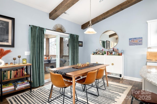 155 Parker Rd, Asheville, NC 28805 - dining room with baseboards, vaulted ceiling with beams, and dark wood finished floors