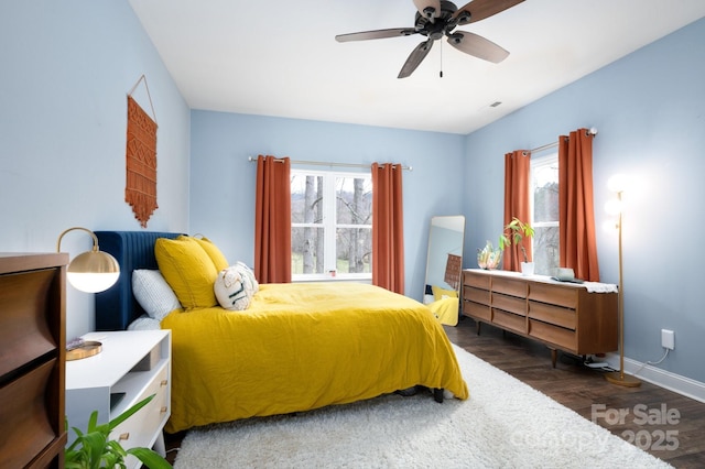 155 Parker Rd, Asheville, NC 28805 - bedroom with ceiling fan, multiple windows, baseboards, and wood finished floors