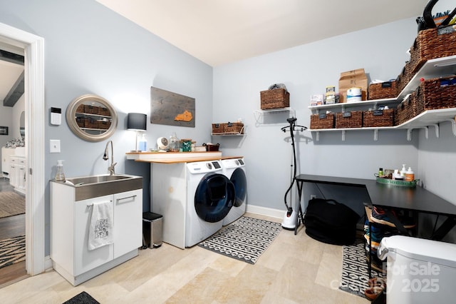 155 Parker Rd, Asheville, NC 28805 - laundry room featuring independent washer and dryer, laundry area, a sink, and baseboards