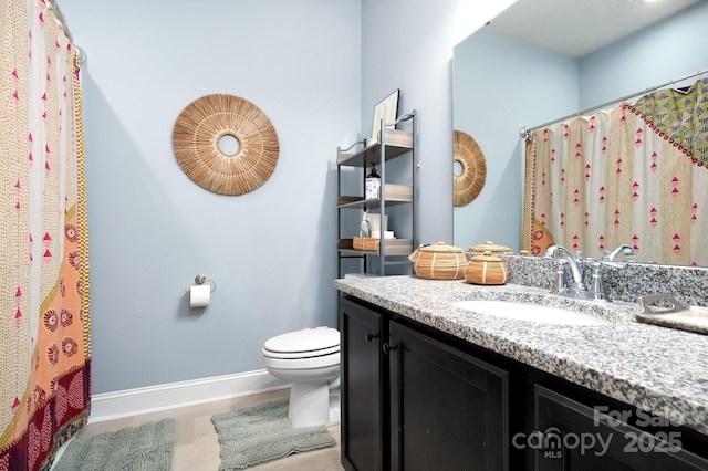 155 Parker Rd, Asheville, NC 28805 - bathroom with toilet, vanity, baseboards, and a shower with curtain