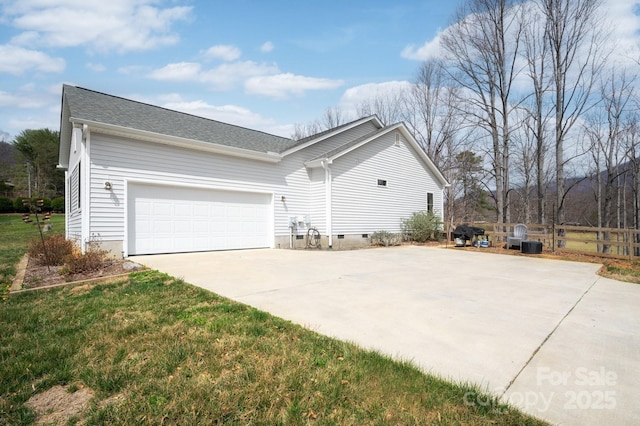 155 Parker Rd, Asheville, NC 28805 - view of home's exterior featuring a garage, crawl space, a lawn, fence, and driveway