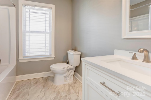 full bathroom with a wealth of natural light, a shower, toilet, and vanity