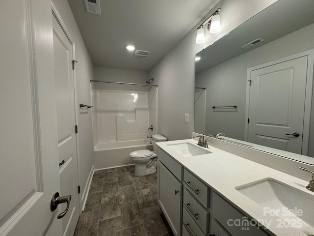 full bathroom with visible vents, toilet, and a sink