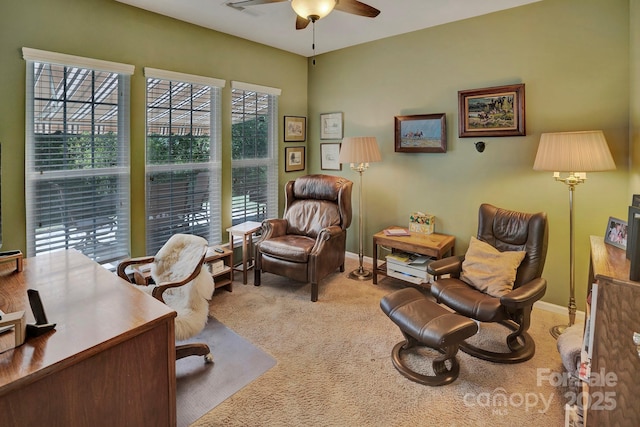 home office with visible vents, baseboards, carpet, and ceiling fan