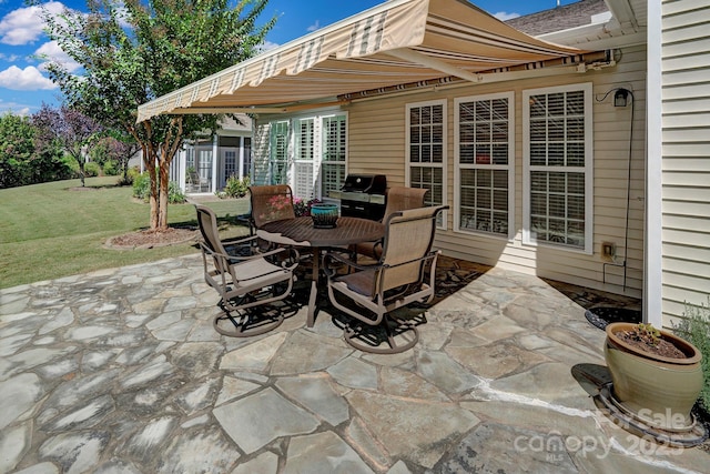 view of patio / terrace with outdoor dining area and area for grilling