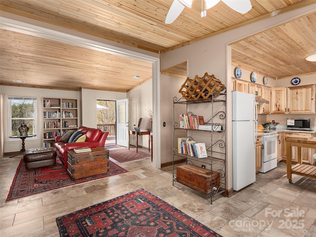 living area with baseboards, wood ceiling, a ceiling fan, and ornamental molding