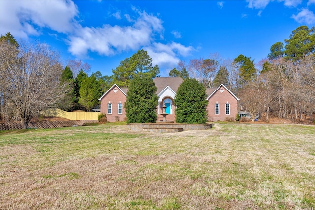 view of front of home featuring a front lawn