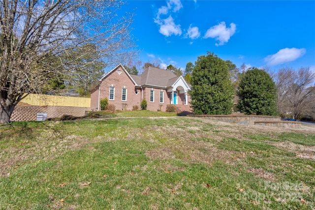 view of front of home with a front lawn