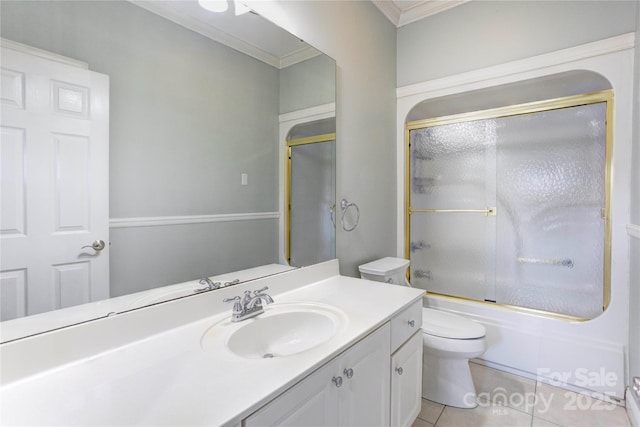 full bath featuring tile patterned flooring, toilet, ornamental molding, shower / bath combination with glass door, and vanity