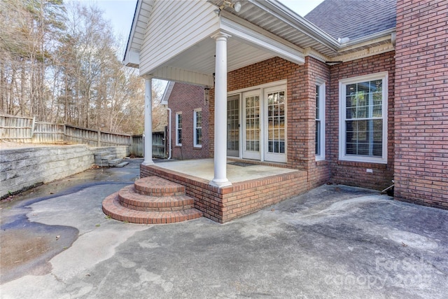 view of patio / terrace featuring fence