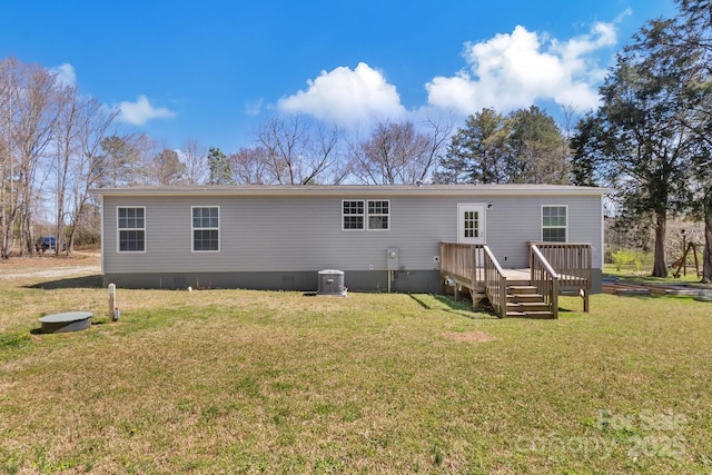 back of house with crawl space, a yard, central AC unit, and a deck