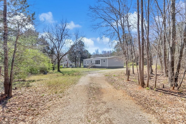 view of road with driveway