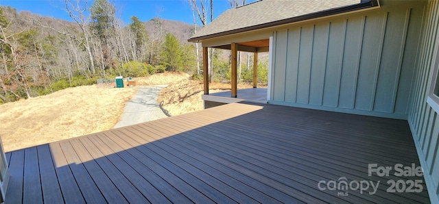 deck with a forest view