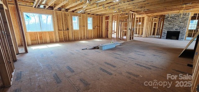 misc room featuring a stone fireplace