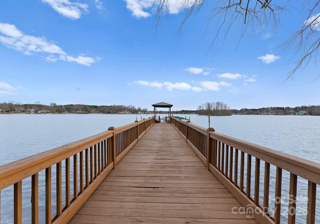 dock area featuring a gazebo and a water view