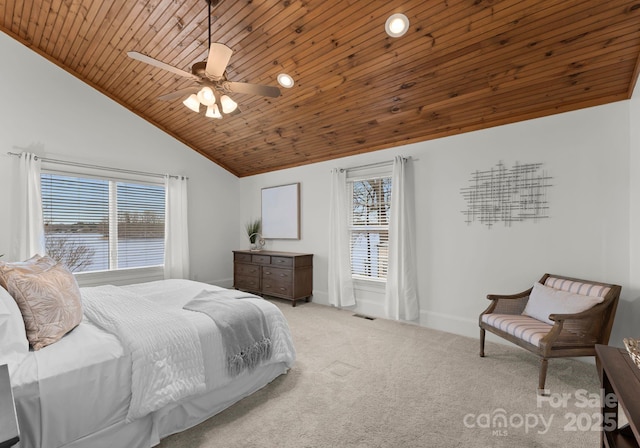 bedroom featuring a ceiling fan, baseboards, visible vents, carpet floors, and wooden ceiling