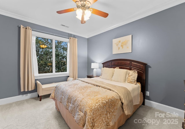 bedroom with visible vents, light carpet, ornamental molding, a ceiling fan, and baseboards