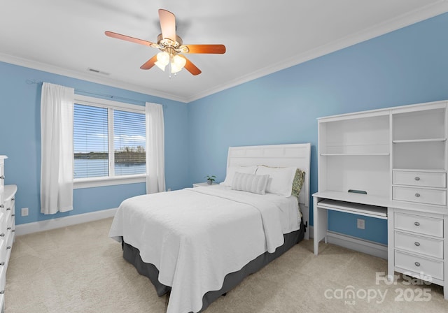 bedroom featuring a ceiling fan, visible vents, baseboards, crown molding, and light colored carpet