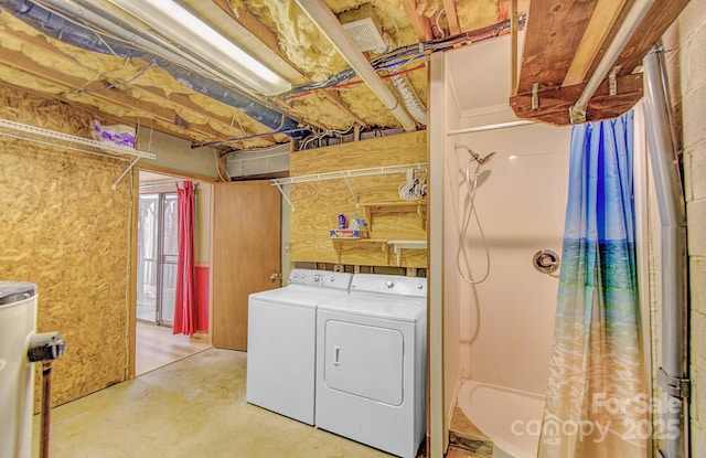 laundry room featuring laundry area and washer and clothes dryer