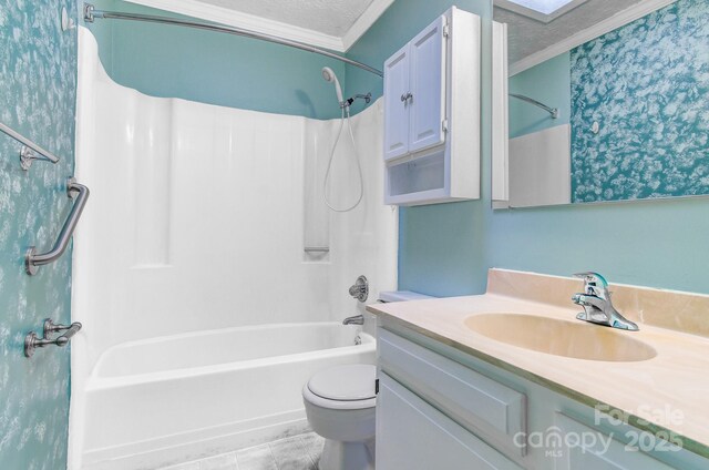 full bathroom with vanity, ornamental molding, bathtub / shower combination, a textured ceiling, and toilet