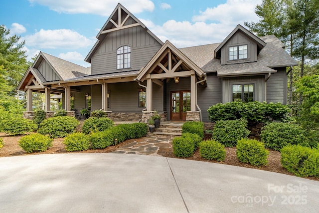 68 Cinch Knot Dr, Nebo, NC 28761 - craftsman inspired home with board and batten siding, french doors, covered porch, roof with shingles, and stone siding