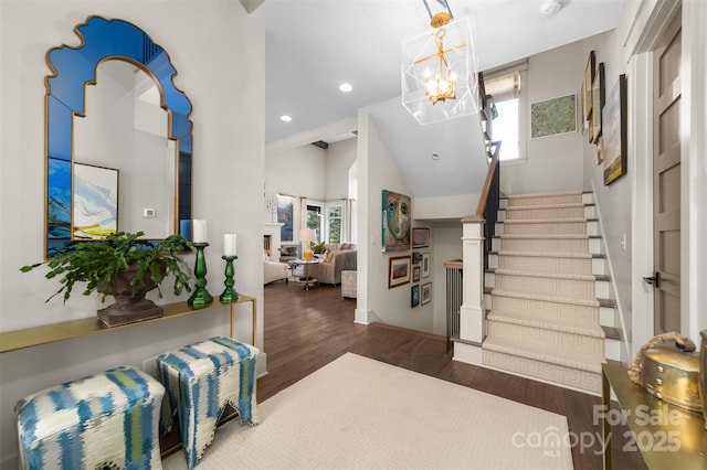 68 Cinch Knot Dr, Nebo, NC 28761 - entryway with healthy amount of natural light, wood finished floors, stairway, a chandelier, and recessed lighting