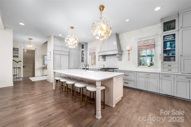 68 Cinch Knot Dr, Nebo, NC 28761 - kitchen featuring custom exhaust hood, light countertops, a chandelier, range, and dark wood finished floors