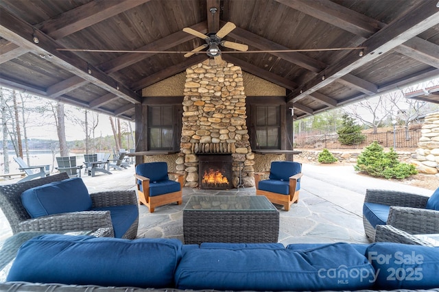 68 Cinch Knot Dr, Nebo, NC 28761 - view of patio / terrace featuring an outdoor living space with a fireplace, a ceiling fan, and a water view